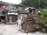 Mr. Sakazume in front of his house